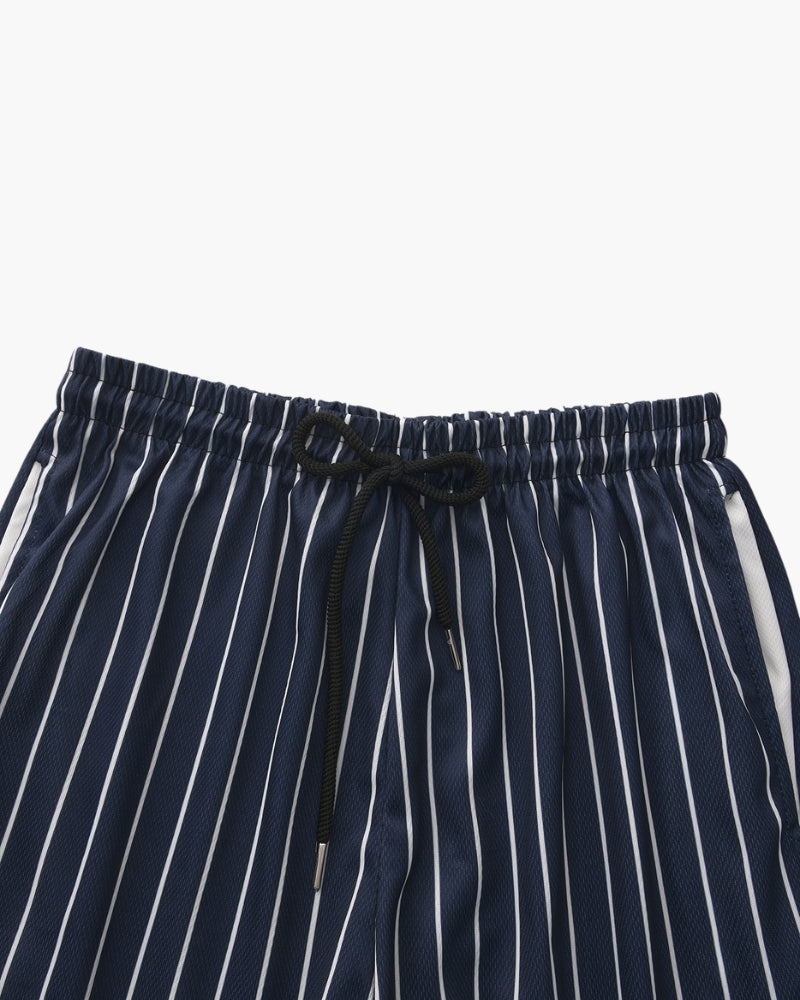 Tide Swim Trunks