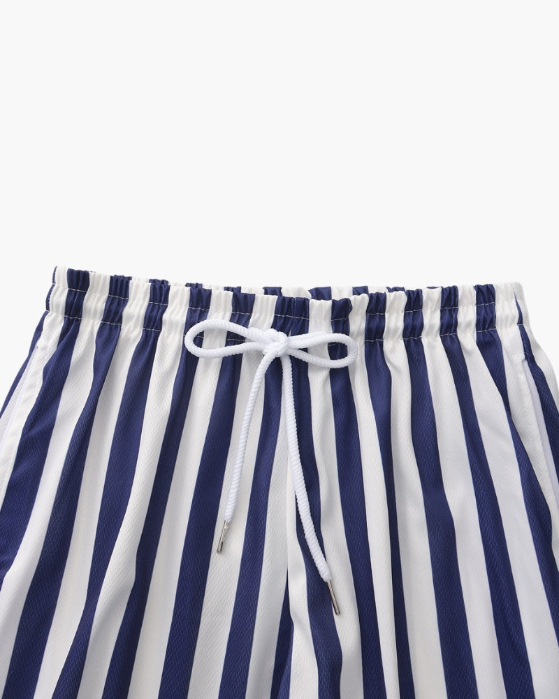 Tide Swim Trunks